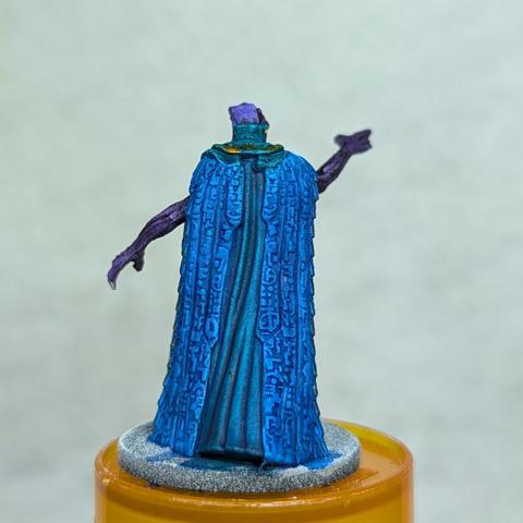 The same miniature from the rear.  Strange runes are all over the back of the robe.
