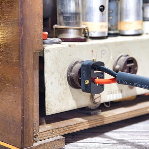 BOSU B&amp;O Universal Plug plugged in to a B&amp;O Radio, backside