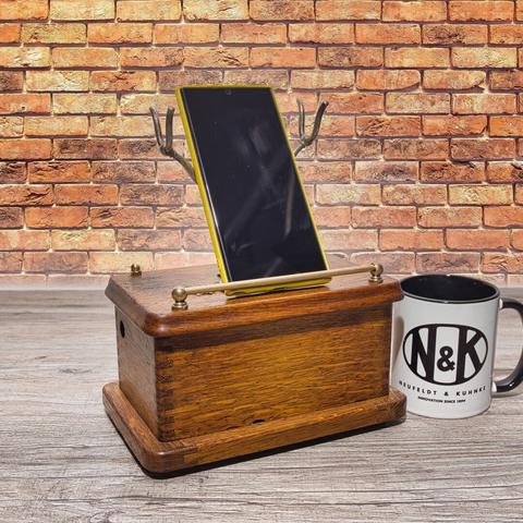 Tablet Dock Made from a 100-Year-Old OB Telephone - perspective view with smnart phone