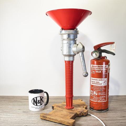 table lamp made from a old fire hose nozzle - perspective view with decoration