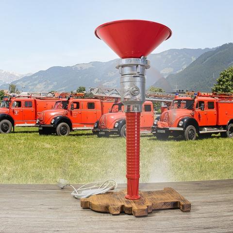 table lamp made from a old fire hose nozzle - perspective view