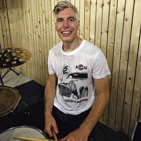 Beyond the Pale drummer Johnny in a soaking wet t-shirt after an intense rehearsal session
