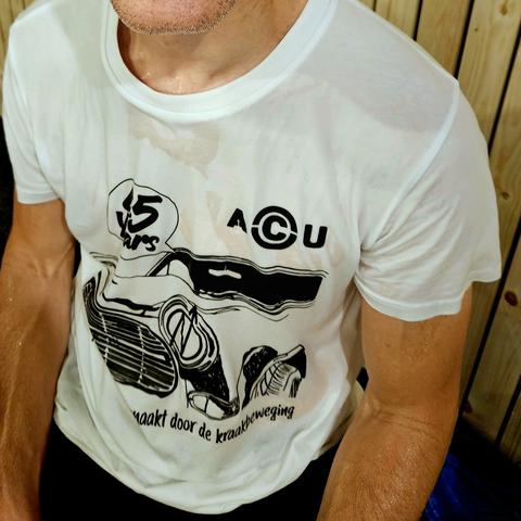 A white t-shirt with black print stating: "ACU 45 years. Mede mogelijk gemaakt door de kraakbeweging"