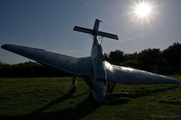 picture of the stainless steel scuplture of a german STUKA crashing to the ground at the Battle of Britain Memorial in Capel-Le-Ferne