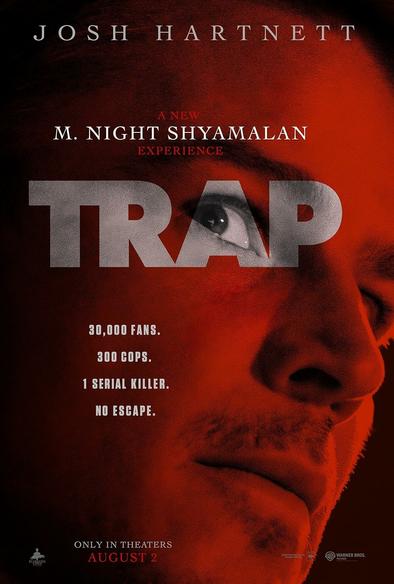 Movie poster featuring Josh Hartnett for a film titled Trap. The poster has a red tint with Hartnett’s face partially shown in close-up. The text reads:

30,000 fans
300 cops
1 serial killer
No escape