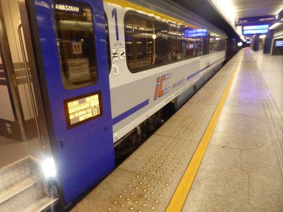 IC 61104 to Byalistok, leaving from Warsaw; passenger wagon half divided in compartments