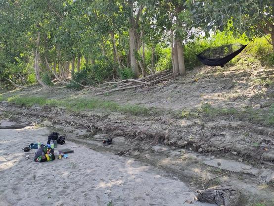An overnight setup on a beach with a hamok