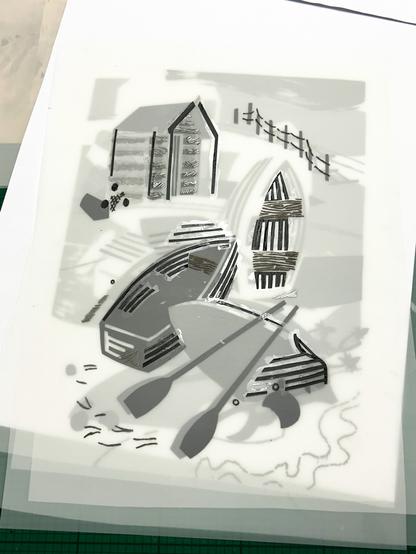 Hand made stencils for printmaking overlaying one another. They depict upturned boats.