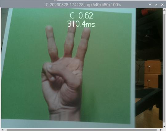 TensorFlowLite claiming to confidently recognize an ASL finger spelling C when shown fingers  for the letter W.