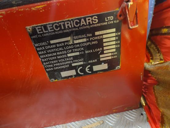 nameplate for the tug. it says it was made by Electricars
