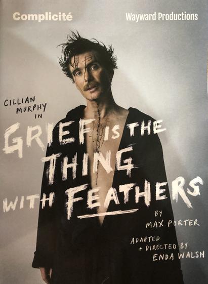 This image is a poster for a production of 'Grief is the Thing with Feathers' starring Cillian Murphy. The title is prominently written in bold, chalk-like typography across the center. Murphy is seen with a disheveled appearance, and his face is partially shadowed, with dark, smeared lines running down his exposed chest from his face. His hair is wild and messy, and he sports a mustache.