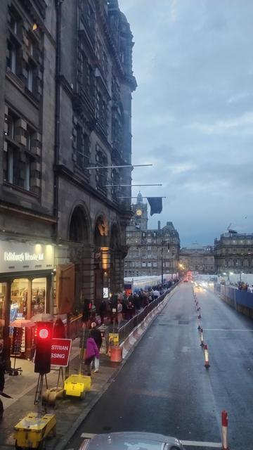 View past old Scotsman building over North Bridge (undergoing renovation), the clock tower of the huge Balmoral Hotel visible on the far end