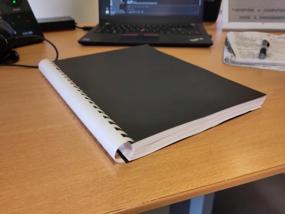 A photo of a self printed 145 page manual, in a nice spiral spine. It's surprisingly huge.