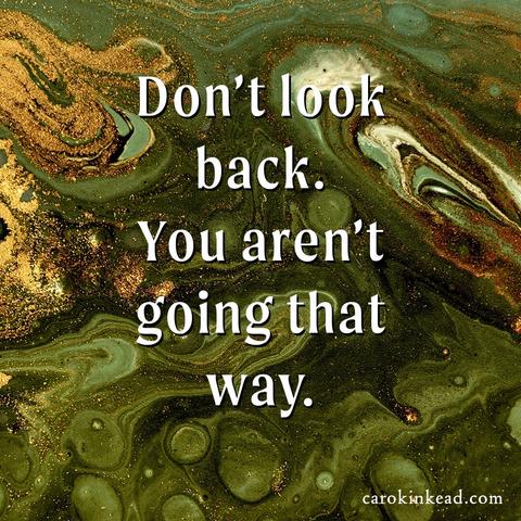 Over a liquid background of green and gold are the words, "Don't look back. You aren't going that way.”