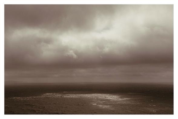 The view out across and into the Atlantic from the Dzogchen Beara pagoda. Stormy seas under stormy skies.