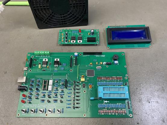 Fully populated PCBs for the Retro Chip Tester Pro on my workbench.