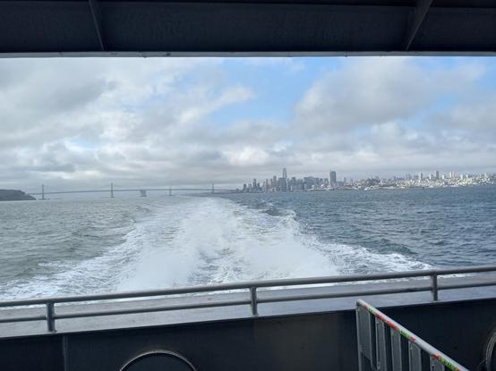 Back deck of ferry, SF receding.