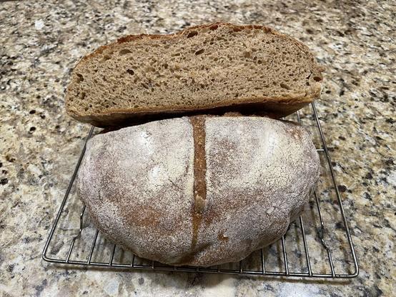 Photo of boule of sourdough rye bread showing the crumb