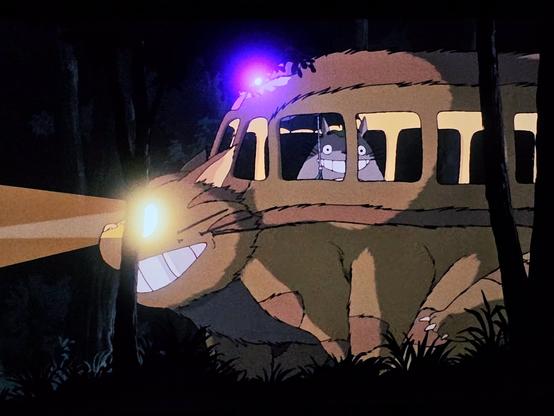 A scene from "My Neighbor Totoro" showing him speeding along in the Catbus.
