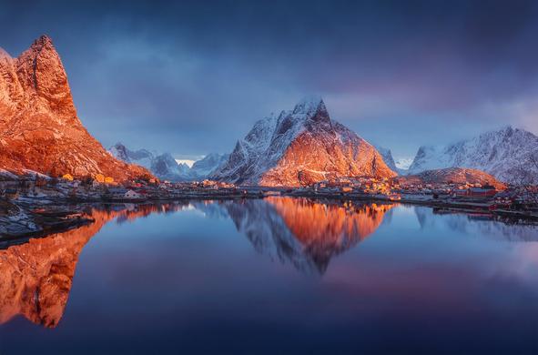 Sunrise over beautiful Reine Village in Lofoten Islands, Norway.Low angle  Arctic light illuminates the scene ,this magic quality of light which can only be seen at high latitudes during the fall and winter months.    Many thanks to everyone who took the trouble to view comment or fave.