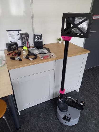 The hello-robot stretch partially unpacked with all its equipment.