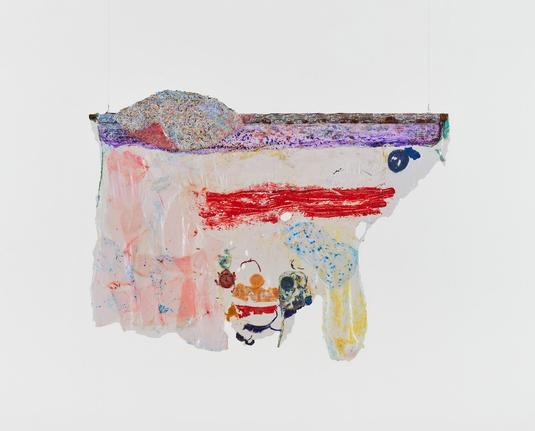 Абстрактная скульптура с несколькими разноцветными яркими мазками. В пятнах и кружочках можно разглядеть лицо и это будет случай апофении. Фотография не передаёт большие размеры объекта (165 × 213 × 10 см), кажется, что он шириной меньше 30 см. // An abstract sculpture with several multi-coloured bright brushstrokes. In the spots and circles you can see a face and this will be a case of apophenia. The photograph does not convey the large dimensions of the object (165 × 213 × 10 cm), it seems that it is less than 30 cm wide. // Suzanne Jackson, “Red over morning sea”, 2021, mixed media