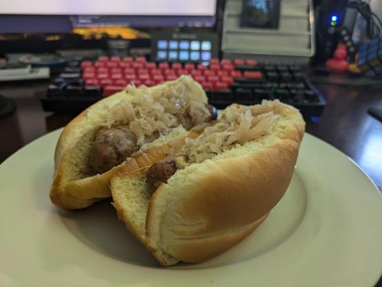 Two bratwursts on a plate