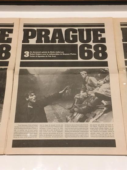 cover of French periodical:  Prague 68

photo of young man pointing with left arm as he yells at tall-booted Soviet troops seated on the edge of a tank, at right