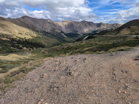 Some mountains above Loveland Pass or the Continental Divide. Water to the east of here flows to the Mississipi. Water to the west tries to get to the Pacific Ocean, but is consumed up by people. The treeline is about 11,000- thats why all the big trees are below us.