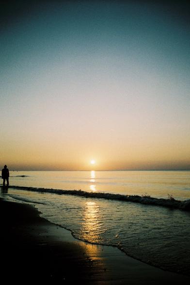 Photo of sunset over the sea.