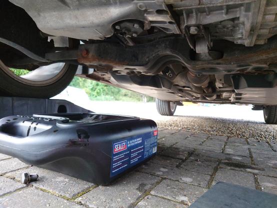 view from underneath VW Polo 6C on ramps, after draining old oil (its quite claustrophobic under there)