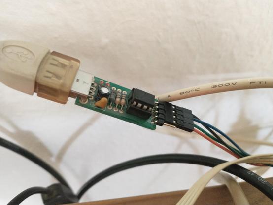 A "Blink Stick Pro" USB stick connected to four jumper wires