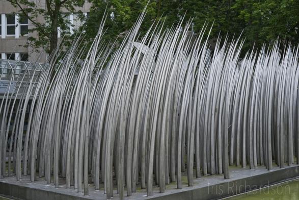 Die Insel stainless steal sculpture at the central train station in Düsselforf Germany. The artist is Horst Antes.
