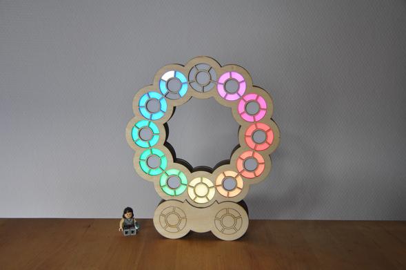 Same clock as previous post.
But now on a wood table in front of a white wall.
The clock is displaying 6:54:52