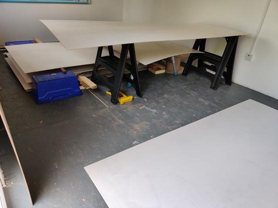 7 sheets of 8 x 4 foot plywood stacked and supported in various ways but generally just above ground level. they are all painted white.