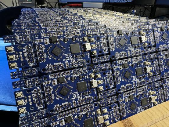 A bunch of iCEBreaker FPGA boards in a rack.