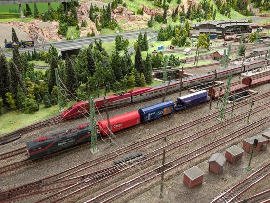 A tiny Thalys waiting in a station in the Miniature attraction in Hamburg.