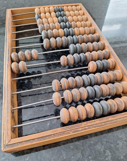 A well used Soviet abacus (счёты in Russian) showing the number 42.