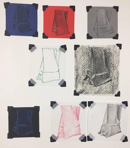 A collection of eight drawings of a crumpled bag, displayed in a grid format with varying colors and styles. Each drawing features a different use of color and shading, mounted on a white background with black corner adhesives.