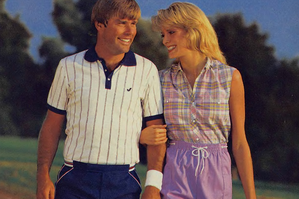 1984 

The image depicts two people, likely athletes given their attire and the setting.
Both are smiling and appear to be engaged in conversation.
They are dressed in sportswear appropriate for playing tennis or golf.
One person is wearing purple shorts, while the other has a white shirt with red stripes, a white headband, and blue shorts.
The background suggests an outdoor setting, possibly a park or a sports club.
Tags: Couple, Golf Course, Smiling, Tennis, Athletic Wear, Conversation