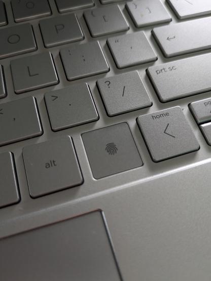 The defective fingerprint sensor on my HP laptop, prior to its replacement under warranty