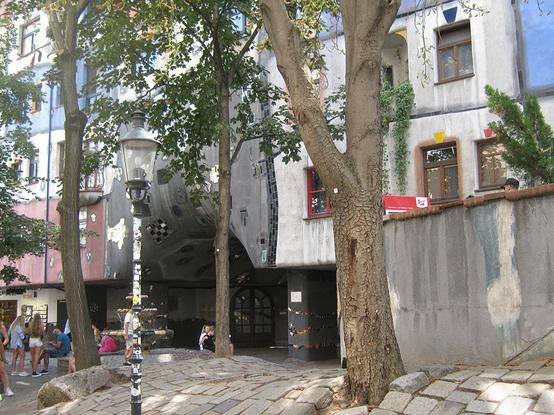 Undulating pavement, trees offering shade