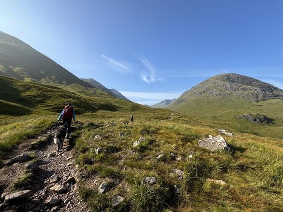 The first climb commences and we set off with Munros to each side. The blue sky reaches the horizon.