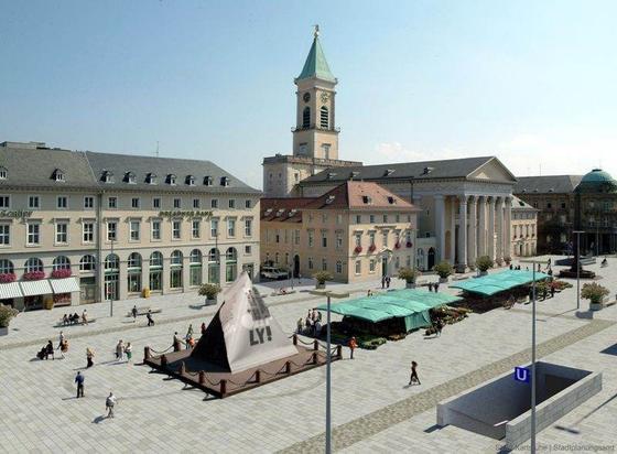 Karlsruhe Marktplatz Pyramide but the an Oatly Tetrahedron was overlayed onto the pyramide.