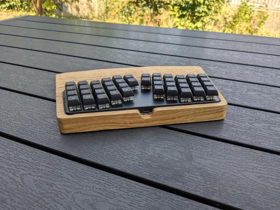 Back side view of the palm rest with the keyboard inside