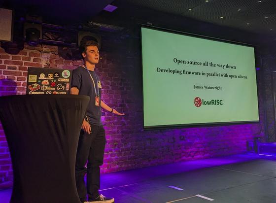 James Wainwright next to the title slide.