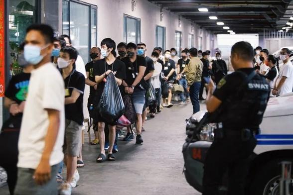 FILE PHOTO. Authorities prepare 180 Chinese for deportation to Shanghai on December 14, 2023. The suspects were caught working at Smart Web Technology POGO hub without proper immigration documents and running an alleged prostitution den in Manila.