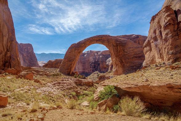 The Rainbow Bridge National Monument is said to be one of the largest known natural bridges in the world. It is majestic, extending 290' into the sky and 275' across Bridge Canyon. So amazing to see firsthand how the power of wind and water had a role in sculpting this remarkable landscape.  It's actually an arch though named as a bridge.  Photography by Debra Martz