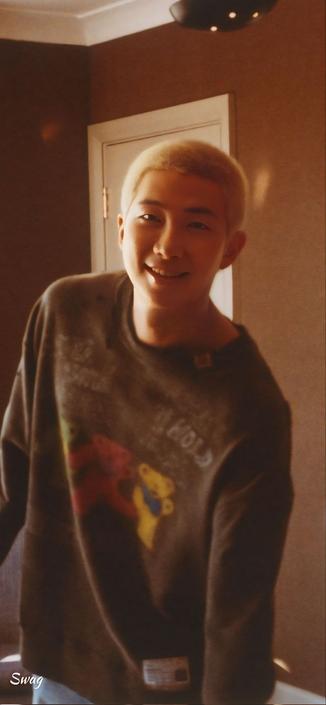 namjoon in promo material for his solo album - long sleeved sweatshirt, buzzed blond hair