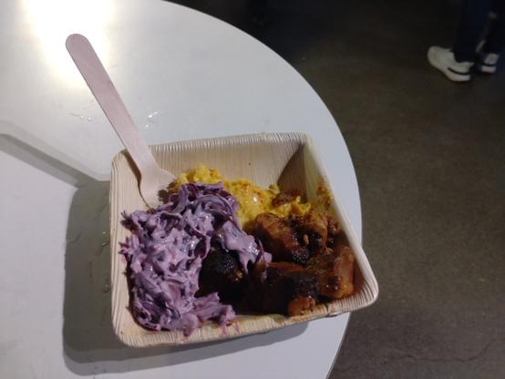 American BBQ at JavaZone 2024 Pork belly 'burnt ends' with creamed corn, coleslaw, and BBQ sauce